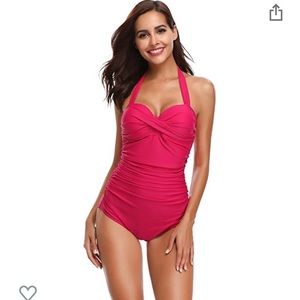 pink one piece swimsuit.
